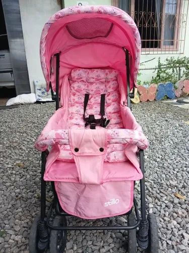 Carrinho de bebê rosa stilus
