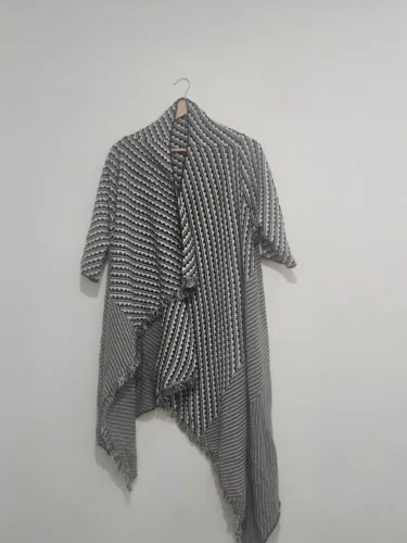 Poncho john john nunca usado