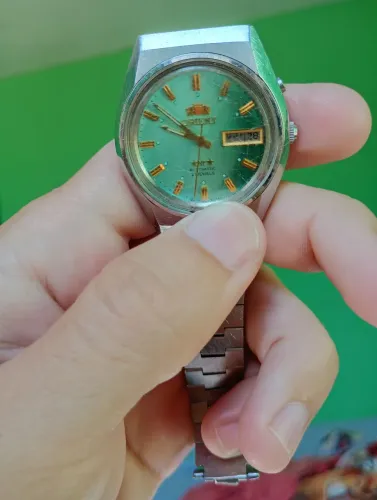 Relógio Orient 3 estrelas 21 rubis Mostrador Verde