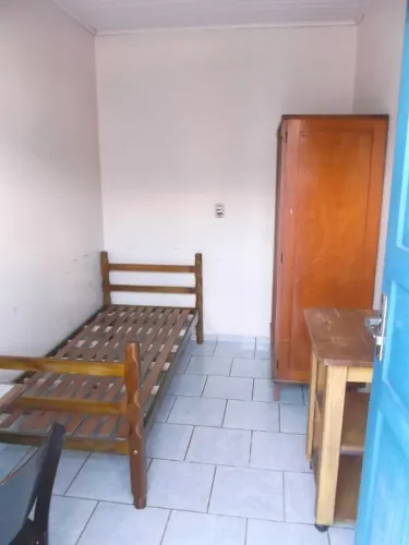 Pensionato masculino no centro