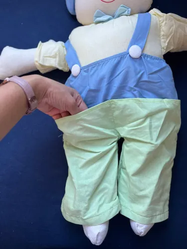 Boneco porta fralda infantil