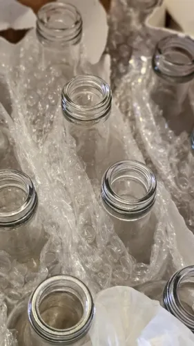 12 Garrafas transparentes, redondas de 500ml com tampa