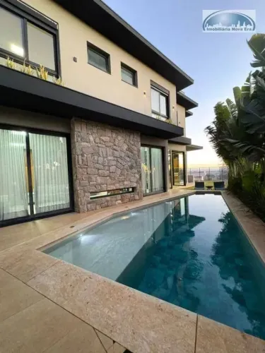 Casa com 4 dormitórios à venda, 470 m² por R$ 4.980.000,00 - Condomínio Campo de Toscana -