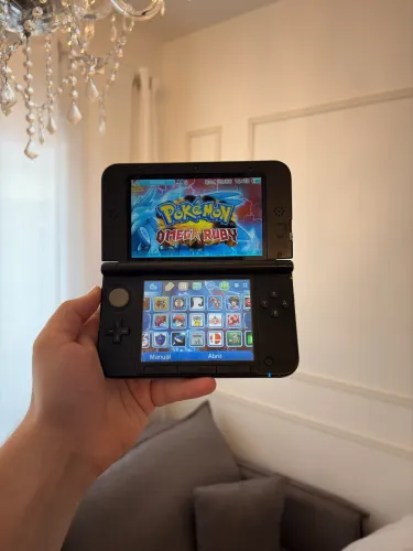 Nintendo 3ds Xl completo com caixa, manuais e jogos como Pokémon Mario Zelda