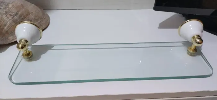 Vendo prateleira para banheiro cor fumê/dourado, Deca Bella Époc.