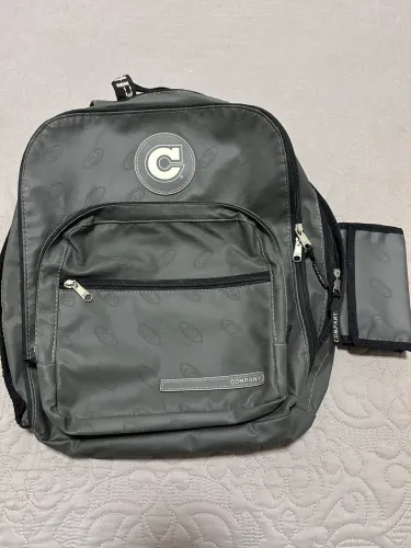 Vendo mochila original Company cinza em ótimo estado anos 90