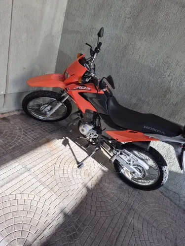 Bros 2012 flex/ injetada
