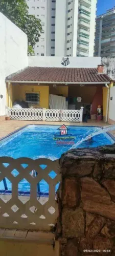 Casa térrea com piscina mais edícula , com 2 dormitórios à venda, 129 m² por R$ 720.000 -