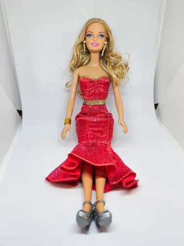 Barbies valor unitário 70 cada.