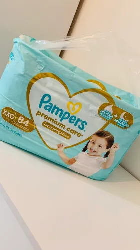Fralda Pampers premium care xxg