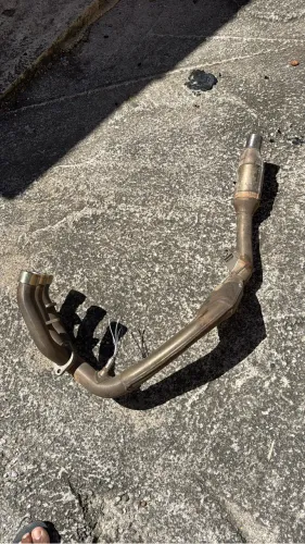 Curva do escapamento da Tiger 900