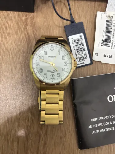 Relógio Orient 50 metros dourado