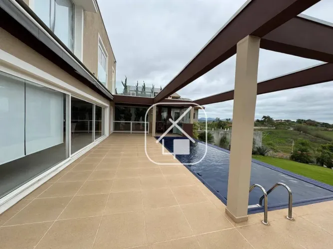 Casa com 4 dormitórios à venda, 400 m² por R$ 1.350.000,00 - Condomínio Lago Dourado - Jac