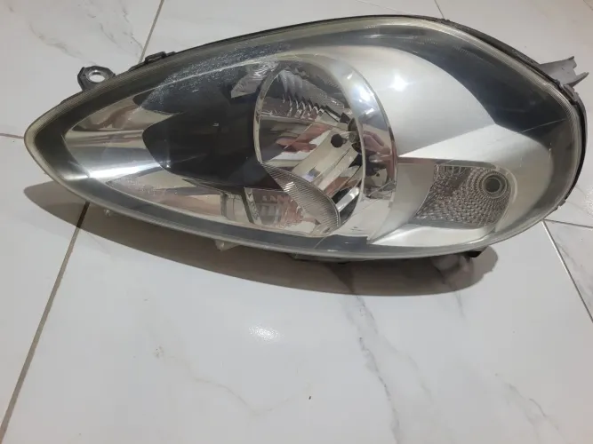 Farol esquerdo fiat punto