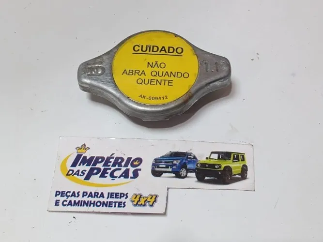 Tampa Radiador Triton Pajero Dakar 08/16 #17396