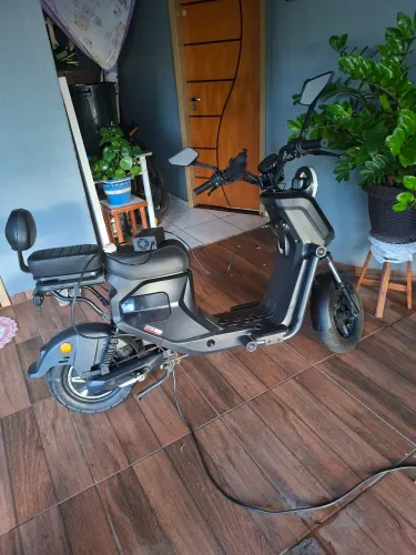 vendo scooter gt1 sport  eletrica semi nova em boa estado de uso primeiro dono tirei na lo