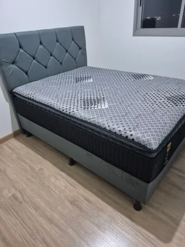 Cama box colchao e cabeceira nova nunca usada.