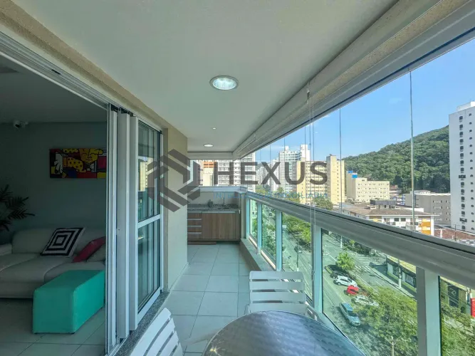 Apartamento com varanda gourmet a lazer na Praia das Pitangueiras, Guaruja