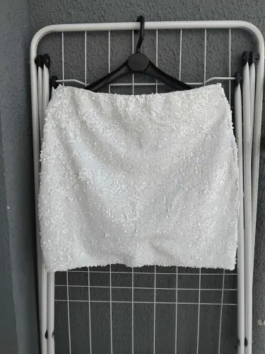 Minissaia em paetê branco com elastano tam G