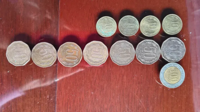 Lote com 12 moedas chilenas em ótimo estado