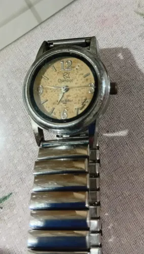 RELÓGIO CHAMPION FEMININO para conserto COM PULSEIRA METALICA ELÁSTICA 3 PINOS QUE MARCA O
