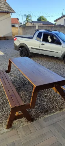 Mesa que vira banco