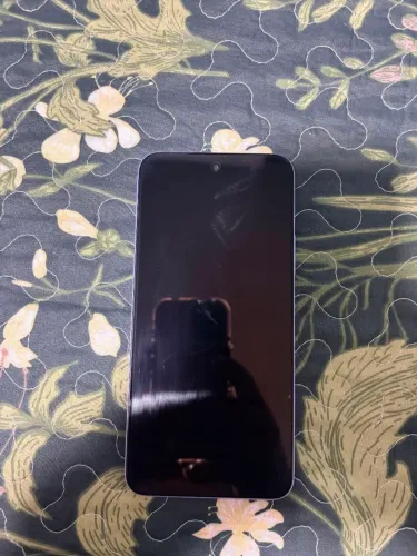 Celular redmi 15 normal