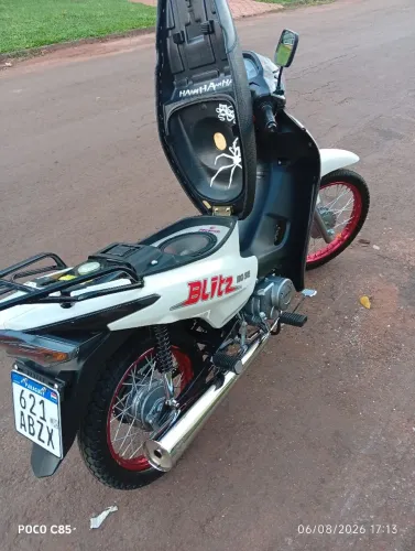 Moto com som e escapamento Estralador original e com baú para entrega
