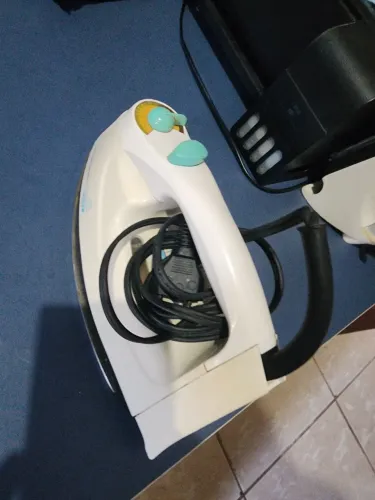 Ferro de passar roupas a vapor