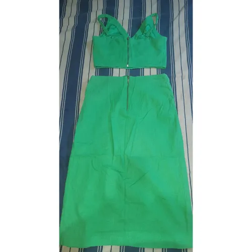 Conjunto tamanho M, cropped e saia midi. Marca Donna Ritz.