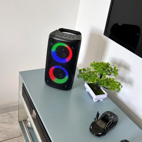Caixa de som bluetooth xtrad com led
