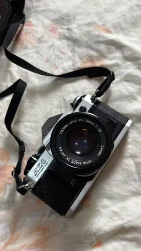 Canon AE-1 Program + Lente Canon FD 50mm f/1.8 ? Analógica
