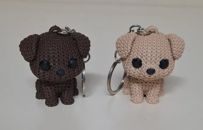 dois cachorrinhos estilo de crochê em impressão 3 d