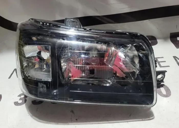 Farol lado direito Uno 2003-2013 Máscara Negra (Não temos o par)
