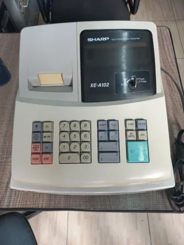 Registradora sharp xe-a102