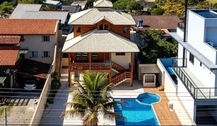 Alugo casa mobiliada, 04 quartos, área gourmte com churrasquera, piscina, sauna, amplo qui