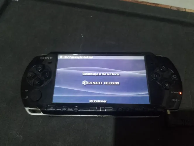 Psp com três jogos.( Pra consertar)