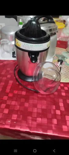Espremedor de suco elétrico