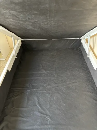 Cama baú casal em corino Ortobom