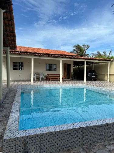 Casa com piscina na praia 