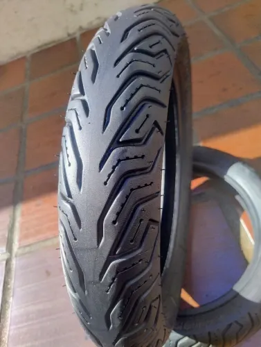 Pneu 110/80-14 Michelin city grip original semi-novo.