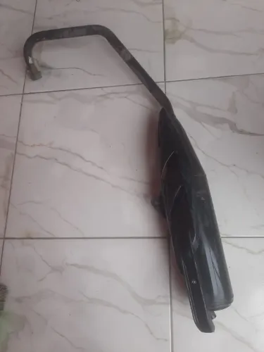 Cano de descarga original factor.