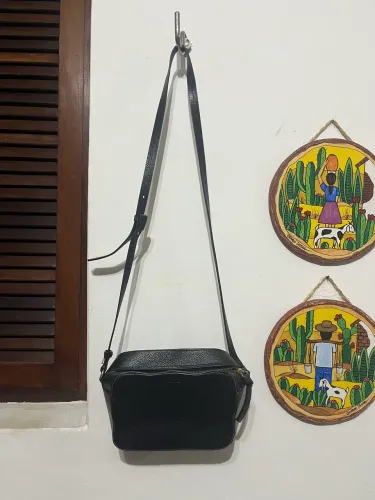 Bolsa Schütz couro
