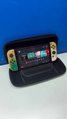 Nintendo switch OLED desbloqueado com 9 jogos instalados.