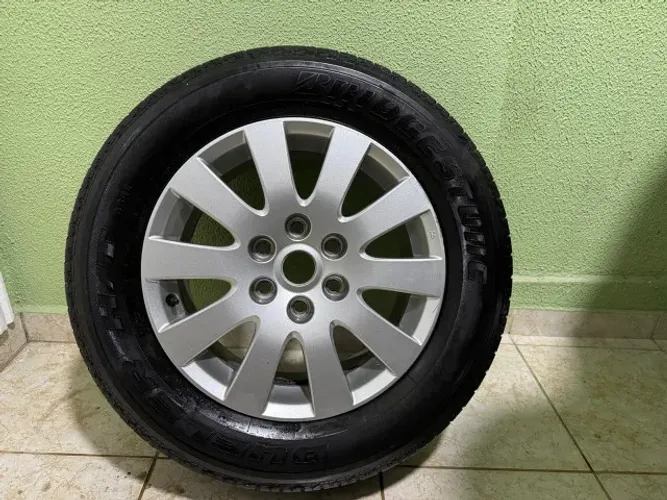 RODA MITSUBISHI ARO 18 ORIGINAl + PNEUS BRIDGESTONE