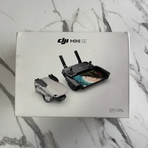 Drone Dji Mini SE na caixa com 2 baterias
