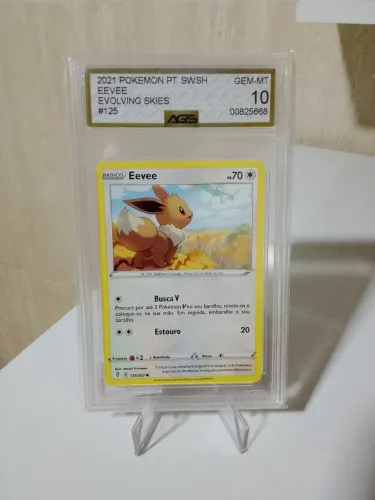 Eevee Evolving Skies 125/203 - Nota AGS 10 GEM-MT - Carta Graduada