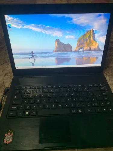 ? Título: Notebook Positivo funcionando - Ideal para estudos e tarefas do dia a dia!