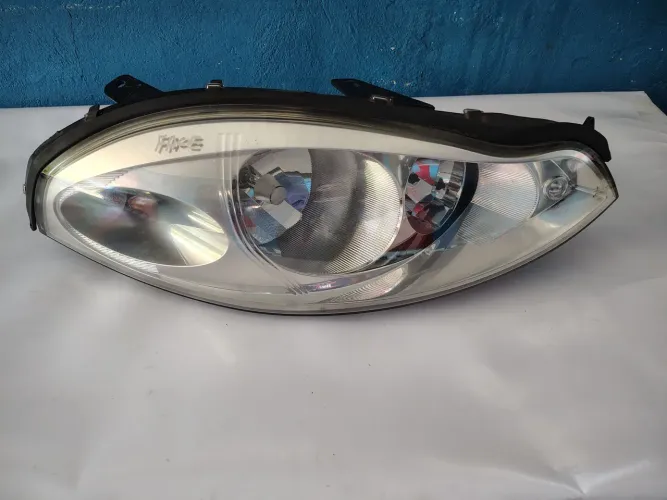 Farol dianteiro cheyr Face lado esquerdo ano 2010 A 2015 original cromado 