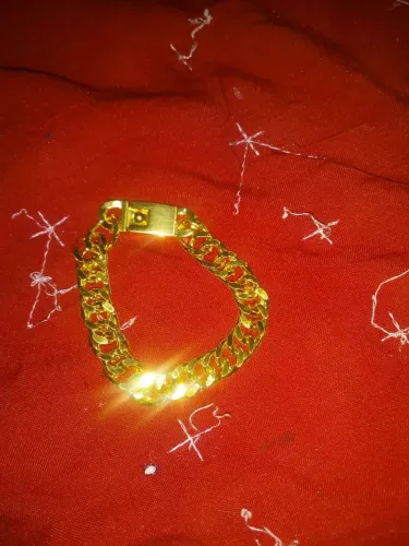 Pulseira dourada masculina com feixo cadeado*nova*!